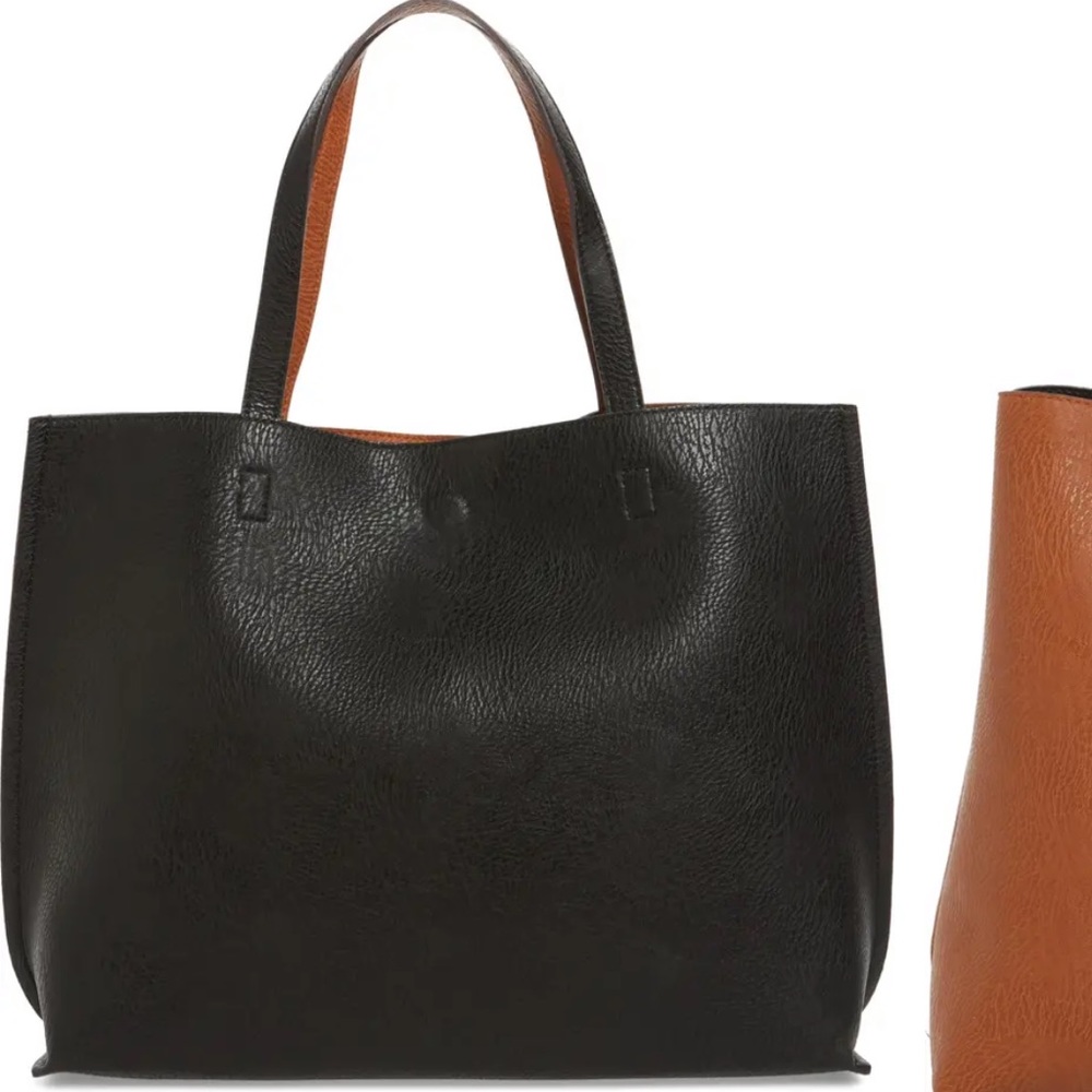 Free People Reversible black leather tote/wristlet